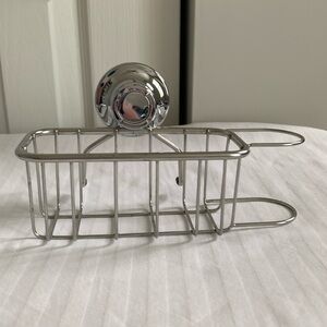 Chrome sink caddy for sponges & brush. Suction cup with tightening mechanism.